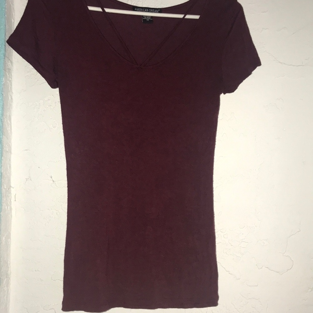 maroon t shirt with fabric going across the top